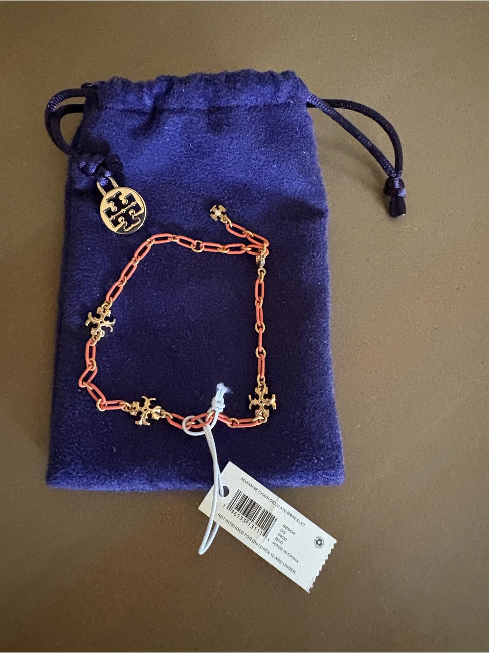 Tory Burch Coral Link Bracelet with Gold Logo Charms